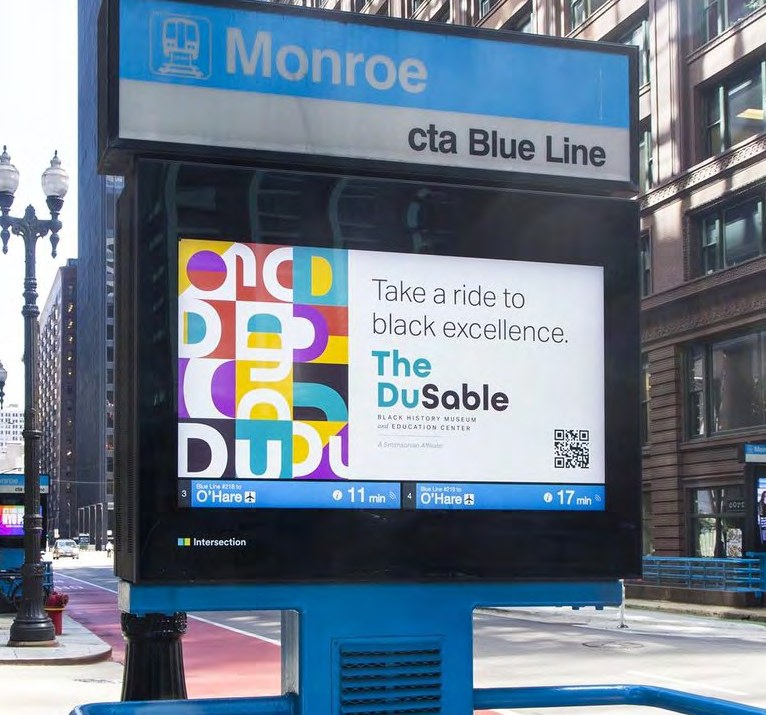 The DuSable brand applied to a CTA transit screen in downtown Chicago